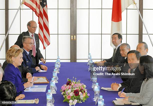 Secretary of States Hillary Clinton and Japanese Defense Minister Yasukazu Hamada talk during their meeting at IIkura Guest House on February 17,...