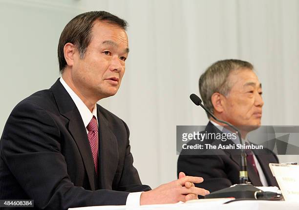 Incoming President Takanobu Ito and outgoing president Takeo Fukui attend a press conference at the company headquarters on February 23, 2009 in...