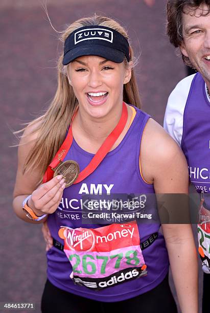 Amy Willerton poses with her medal after completing the 2014 London Marathon on April 13, 2014 in London, England.