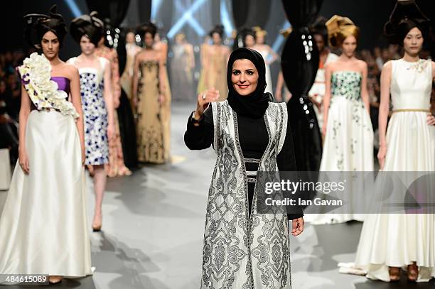 Designer Zareena poses on the runway during the Zareena show finale during Fashion Forward at Madinat Jumeirah on April 13, 2014 in Dubai, United...