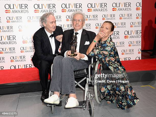 Michael White with his Special Award with award presnters Nigel Planer and Kate Moss during the Laurence Olivier Awards at the Royal Opera House on...