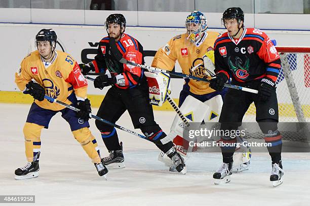 Julien Sprunger and John Fritsche of Fribourg in action with Jesse Virtanen and Ryan Zapolski of Lukko Rauma in action during the Champions Hockey...