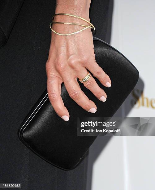 Actress Jennifer Aniston, ring detail, arrives at the Los Angeles Premiere "She's Funny That Way" at Harmony Gold on August 19, 2015 in Los Angeles,...