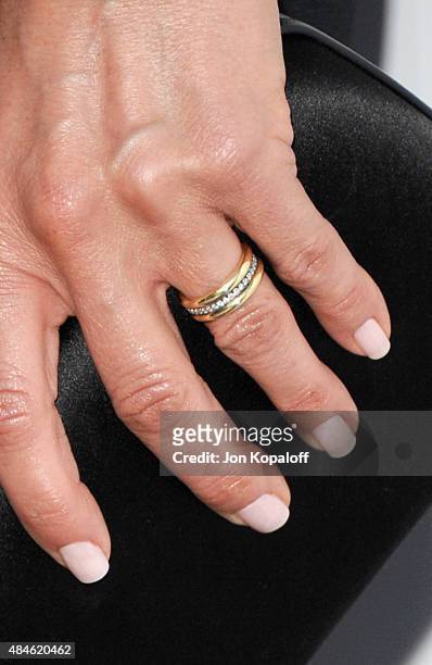 Actress Jennifer Aniston, ring detail, arrives at the Los Angeles Premiere "She's Funny That Way" at Harmony Gold on August 19, 2015 in Los Angeles,...