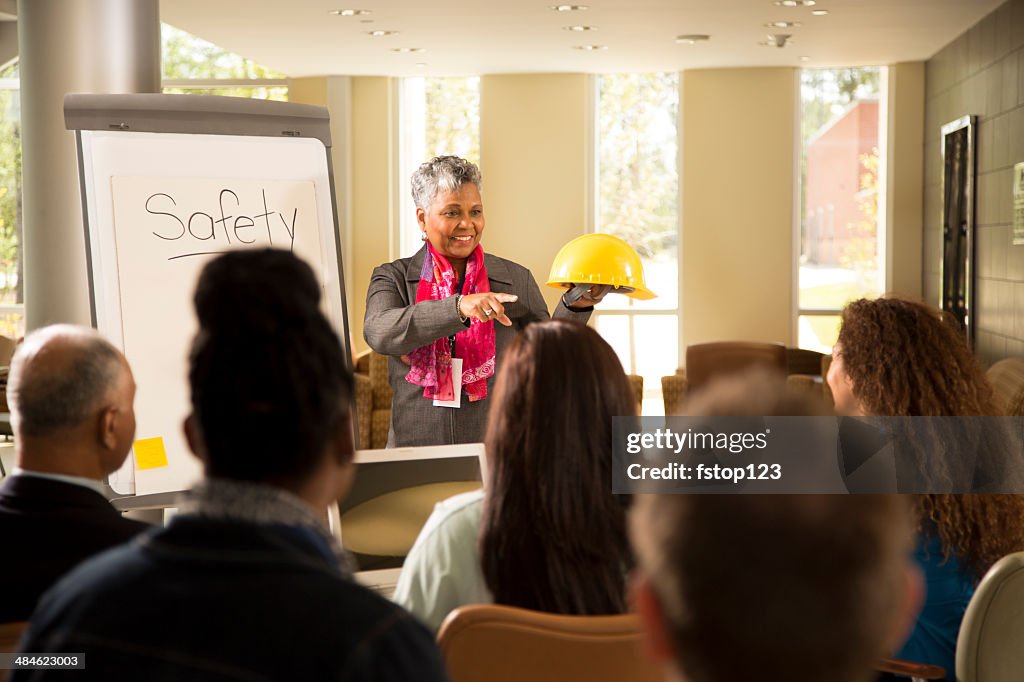 Safety in the workplace. Presentation with office workers.