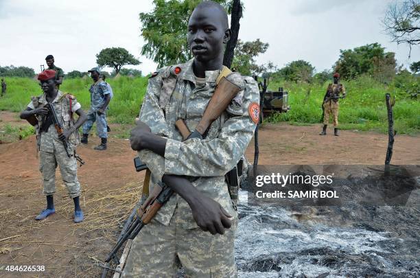 South Sudanese SPLA soldiers are pictured in Pageri in Eastern Equatoria state on August 20, 2015. The spokesman of SPLA, Colonel Philip Aguer...