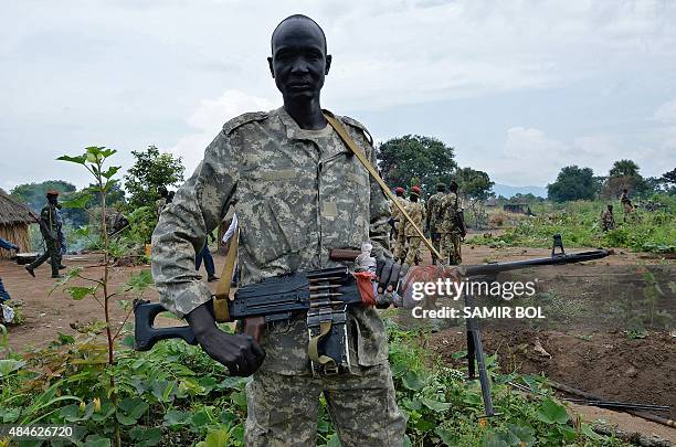 South Sudanese SPLA soldier is pictured in Pageri in Eastern Equatoria state on August 20, 2015. The spokesman of SPLA, Colonel Philip Aguer visited...