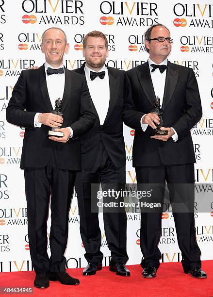 Nicholas Hytner and Nick Starr with their Special award and award presenter James Corden during the Laurence Olivier Awards at the Royal Opera House...