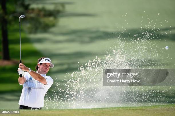 Bubba Watson of the United States plays a bunker shot on the seventh hole during the final round of the 2014 Masters Tournament at Augusta National...