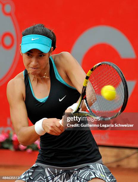 Caroline Garcia of France returns the ball to Jelena Jankovic of Serbia during their WTA Bogota Open final match at El Rancho Club on April 13, 2014...