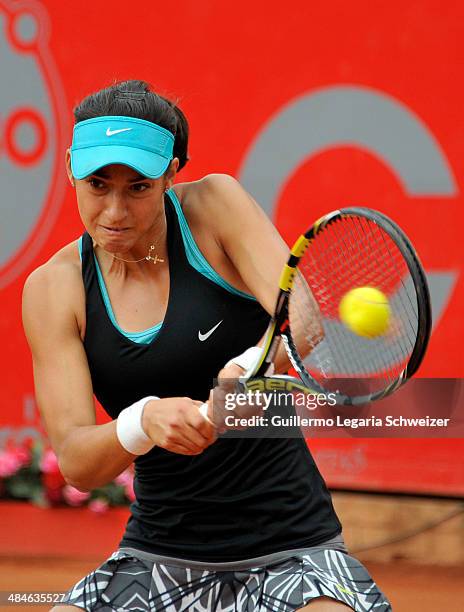 Caroline Garcia of France returns the ball to Jelena Jankovic of Serbia during their WTA Bogota Open final match at El Rancho Club on April 13, 2014...