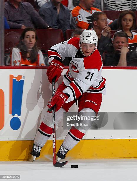 Drayson Bowman of the Carolina Hurricanes takes the puck in the second period against the Philadelphia Flyers at Wells Fargo Center on April 13, 2014...