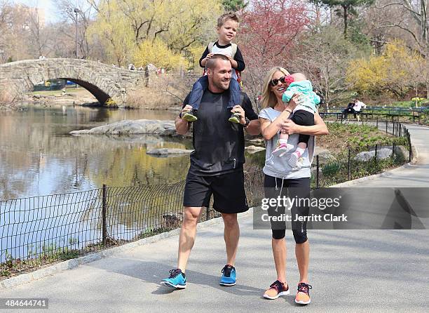 Chris Powell and wife Heidi Powell go for a family outing with son Cash and daughter Ruby at Central Park while in NYC for the Reebok Spartan Race on...