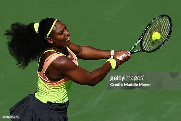 Serena Williams returns a backhand to Karin Knapp of Italy during their match on Day 5 of the Western & Southern Open at the Lindner Family Tennis...