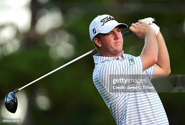 Tom Hoge tees off on the 18th hole during the first round of the Wyndham Championship at Sedgefield Country Club on August 20, 2015 in Greensboro,...