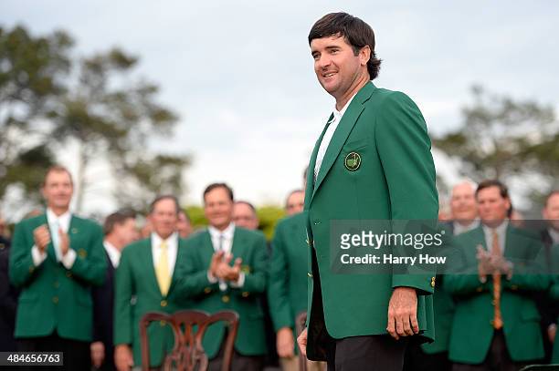 Bubba Watson of the United States poses with the green jacket after winning the 2014 Masters Tournament by a three-stroke margin at Augusta National...
