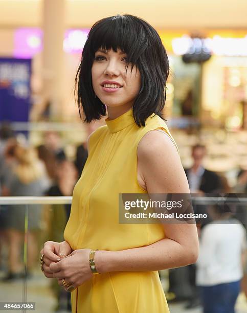 Singer Carly Rae Jepsen poses before performing for JetBlue's Live From T5 at John F. Kennedy International Airport on August 20, 2015 in New York...