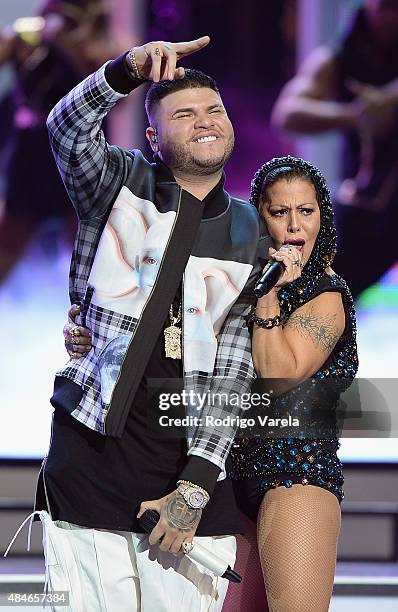 Farruko and Alejandra Guzman perform onstage at Telemundo's "Premios Tu Mundo" Awards 2015 at American Airlines Arena on August 20, 2015 in Miami,...