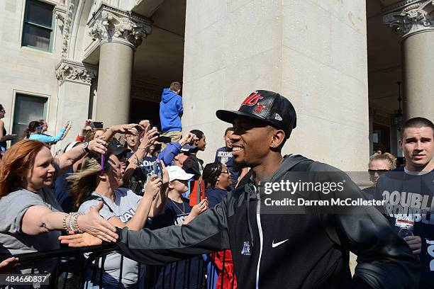 University of Connecticut's Ryan Boatright takes part in a victory parade April 13, 2014 in Hartford, Connecticut. Both the men's and women's Huskies...