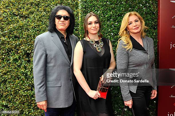 Guitarist Gene Simmons, Sophie Simmons, and actress Shannon Tweed arrives at the John Varvatos 11th Annual Stuart House Benefit presented by...