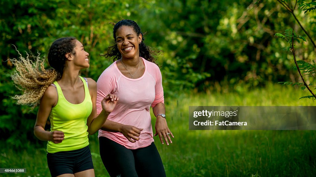Mother and Daughter Exercising