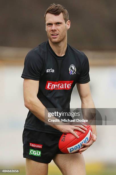 Matt Scharenberg looks upfield during a Collingwood Magpies AFL training session at Westpac Centre on August 21, 2015 in Melbourne, Australia.