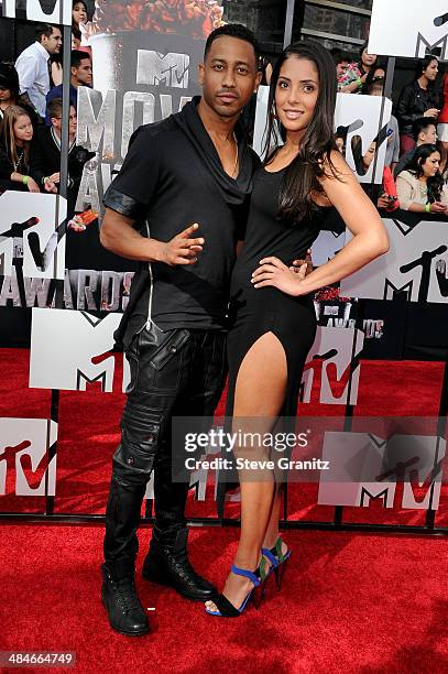 Actor Brandon T. Jackson and Denise Marie Xavier attend the 2014 MTV Movie Awards at Nokia Theatre L.A. Live on April 13, 2014 in Los Angeles,...