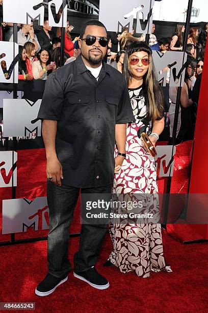 Actor/recording artist Ice Cube and Kimberly Woodruff attend the 2014 MTV Movie Awards at Nokia Theatre L.A. Live on April 13, 2014 in Los Angeles,...