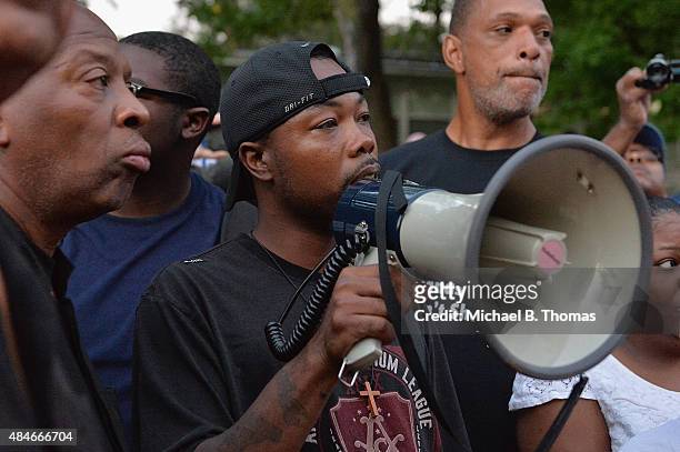 James Bolden, father of Jamyla Bolden, speaks to the crowd of mourners during a candlelight vigil held in honor of his daughter Jamyla Bolden on...