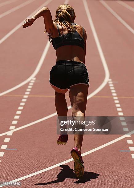 An athlete practices a sprint start ahead of the 15th IAAF World Athletics Championships Beijing 2015 at the Beijing National Stadium on August 21,...