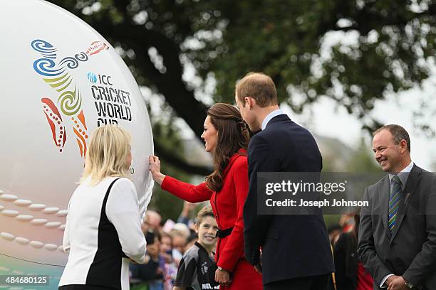 Catherine, Duchess of Cambridge reaches out to touch the replica cricket ball with Prince William, Duke of Cambridge. Therese Walsh, Head of New...