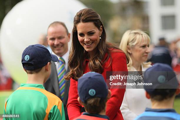 Catherine, Duchess of Cambridge greets young cricketers during the countdown to the 2015 ICC Cricket World Cup at Latimer Square on April 14, 2014 in...
