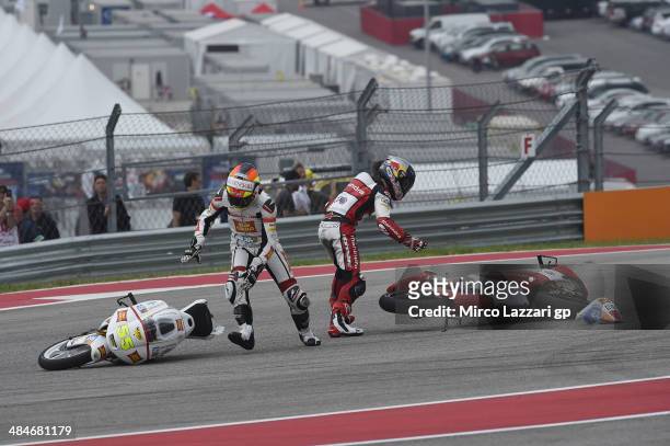 Andrea Locatelli of Italy and san Carlo Team Italia and Arthur Sissis of Australia and Mahindra Racing crashed out during the Moto3 race during the...