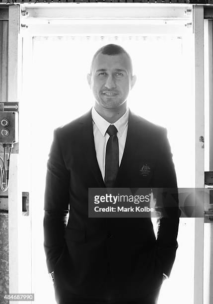 Quade Cooper poses during the Australian Wallabies Rugby World Cup squad announcement at Hangar 96, Qantas Sydney Jet Base on August 21, 2015 in...