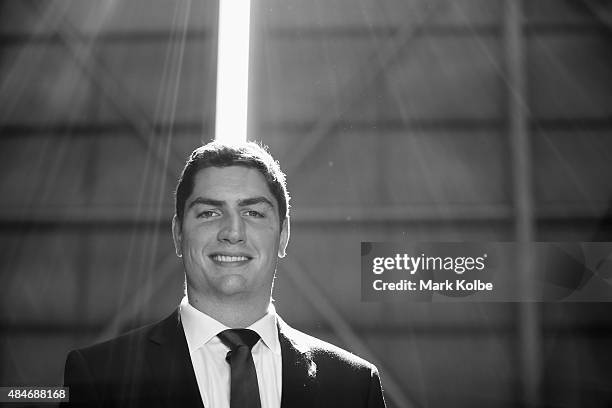 Rob Simmons poses during the Australian Wallabies Rugby World Cup squad announcement at Hangar 96, Qantas Sydney Jet Base on August 21, 2015 in...