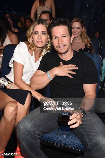 Actor Mark Wahlberg and model Rhea Durham attend the 2014 MTV Movie Awards at Nokia Theatre L.A. Live on April 13, 2014 in Los Angeles, California.