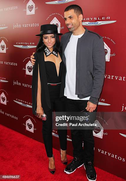 Actors Kat Graham and Cottrell Guidry attend the 11th annual Stuart House Benefit at John Varvatos on April 13, 2014 in Los Angeles, California.