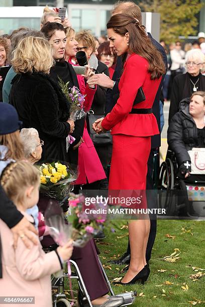 Catherine, the Duchess of Cambridge , and her husband Prince William speak to families who lost loved ones in the 2011 earthquake, during visit to...