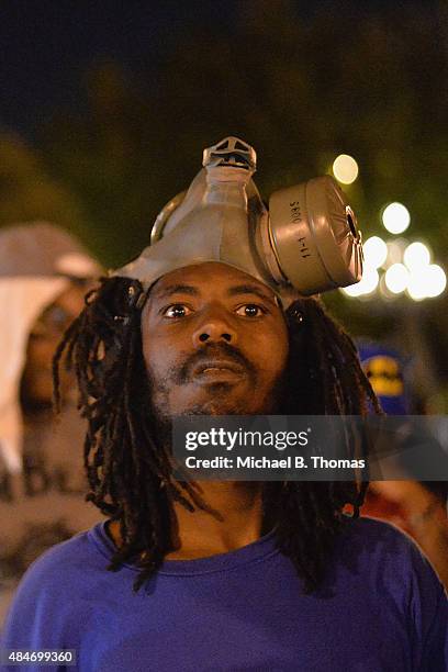 Demonstrator looks on during a protest action through the Central West End of St. Louis, Missouri on August 20, 2015. After a night of unrest sparked...