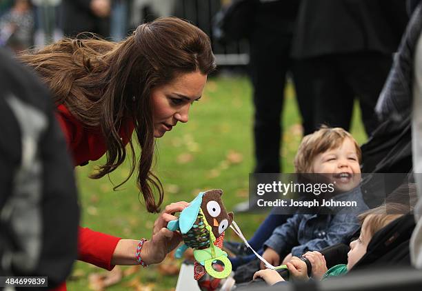 Catherine, Duchess of Cambridge greets young toddlers during the countdown to the 2015 ICC Cricket World Cup at Latimer Square on April 14, 2014 in...