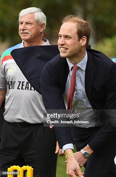 Prince William, Duke of Cambridge, bowls under the watchful eye of Sir Richard Hadlee, ICC Cricket World Cup 2015 Ambassador during a game of cricket...