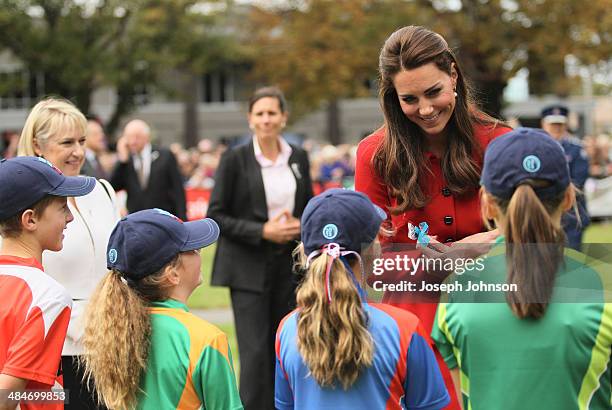 Catherine, Duchess of Cambridge greets young cricketers during the countdown to the 2015 ICC Cricket World Cup at Latimer Square on April 14, 2014 in...