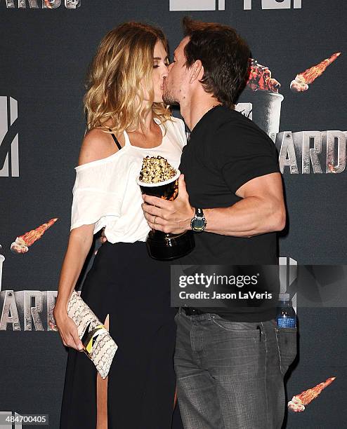 Rhea Durham and Mark Wahlberg pose in the press room at the 2014 MTV Movie Awards at Nokia Theatre L.A. Live on April 13, 2014 in Los Angeles,...