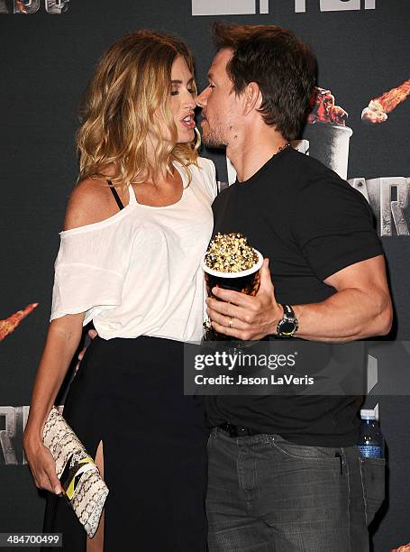 Rhea Durham and Mark Wahlberg pose in the press room at the 2014 MTV Movie Awards at Nokia Theatre L.A. Live on April 13, 2014 in Los Angeles,...