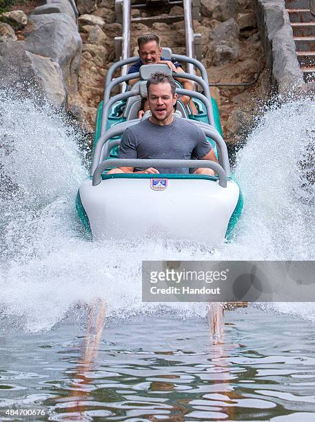 In this handout photo provided by Disney Parks, Matt Damon rides Matterhorn Bobsleds with family and friends August 20, 2015 at Disneyland park in...