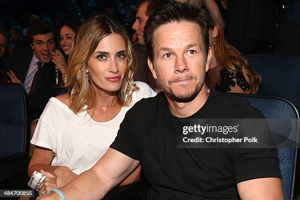 Honoree Mark Wahlberg and model Rhea Durham attend the 2014 MTV Movie Awards at Nokia Theatre L.A. Live on April 13, 2014 in Los Angeles, California.