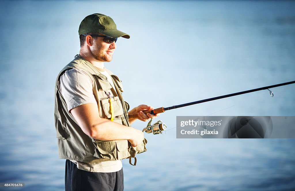 Fly fishing on river.