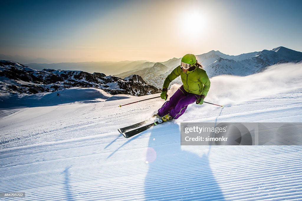 Woman skiing downhill