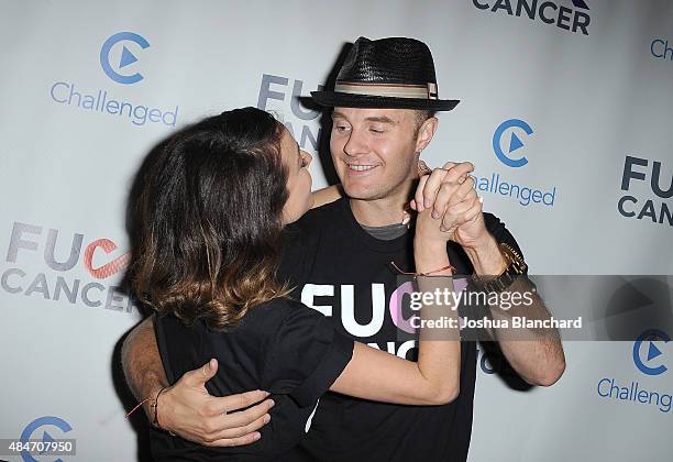 Shira Lazar and Bart Baker arrive at the FCancer Benefit Event at Bootsy Bellows on August 20, 2015 in West Hollywood, California.