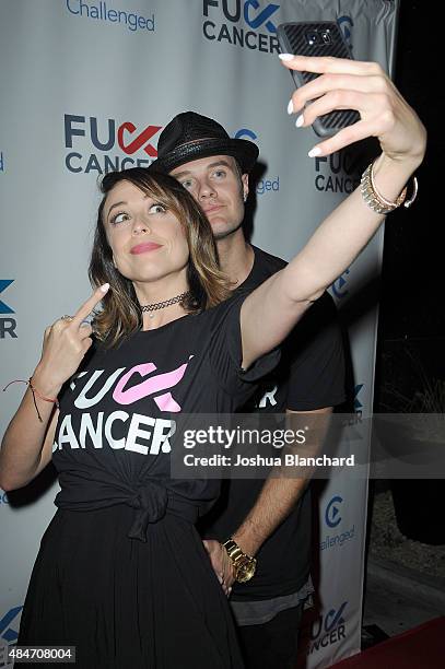 Shira Lazar and Bart Baker arrive at the FCancer Benefit Event at Bootsy Bellows on August 20, 2015 in West Hollywood, California.